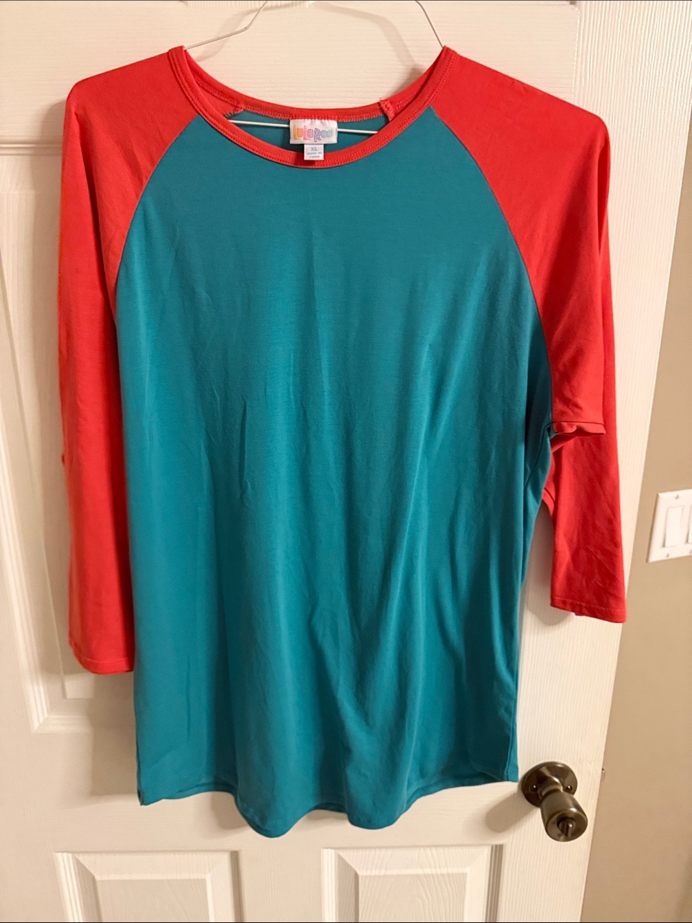 LuLaRoe Teal Body with Red Raglan Sleeves Jersey
